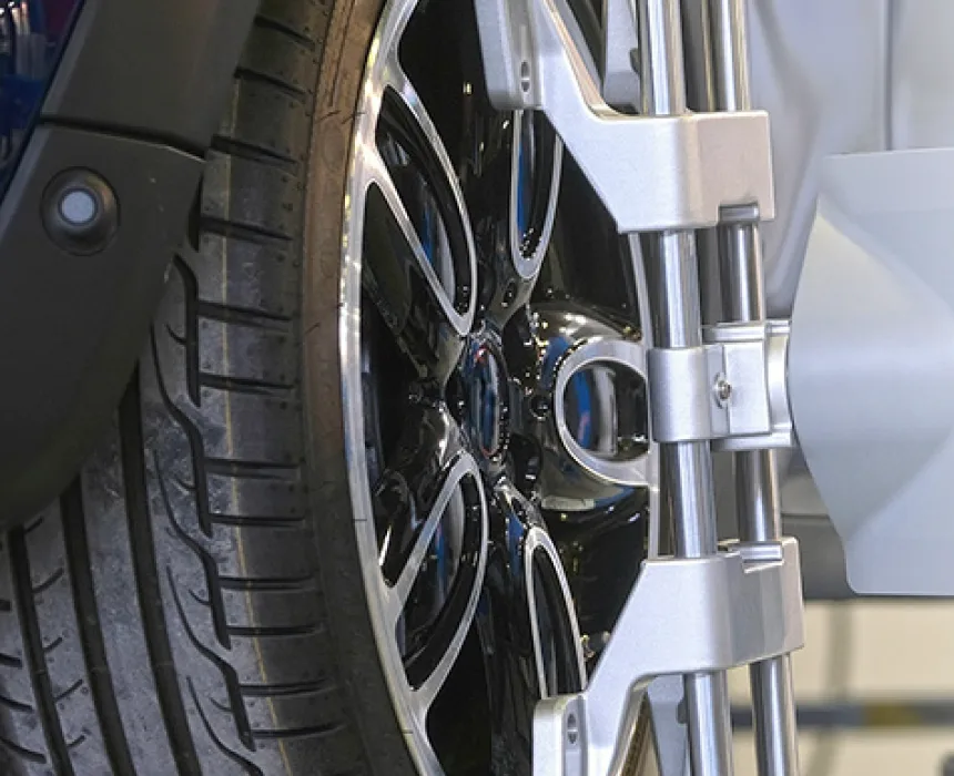 Car wheel on a wheel alignment machine at Sadguru Automobiles, tyre shop in Raipur