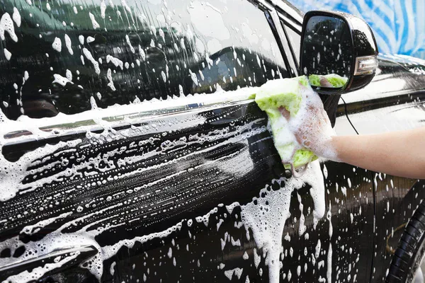 Car being washed with foam