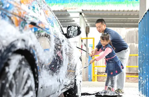 Car interior being cleaned